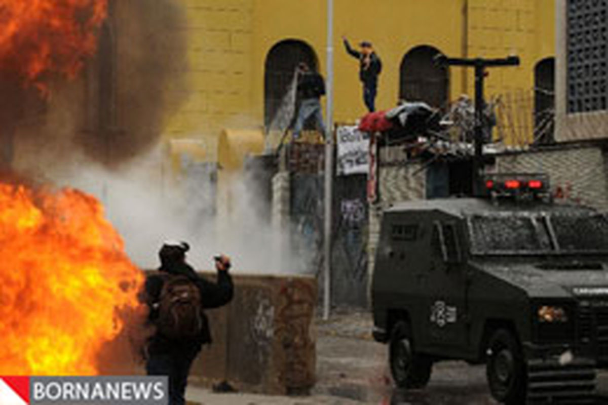 درگیری میان پلیس ضد شورش و معترضان در شیلی + تصاویر