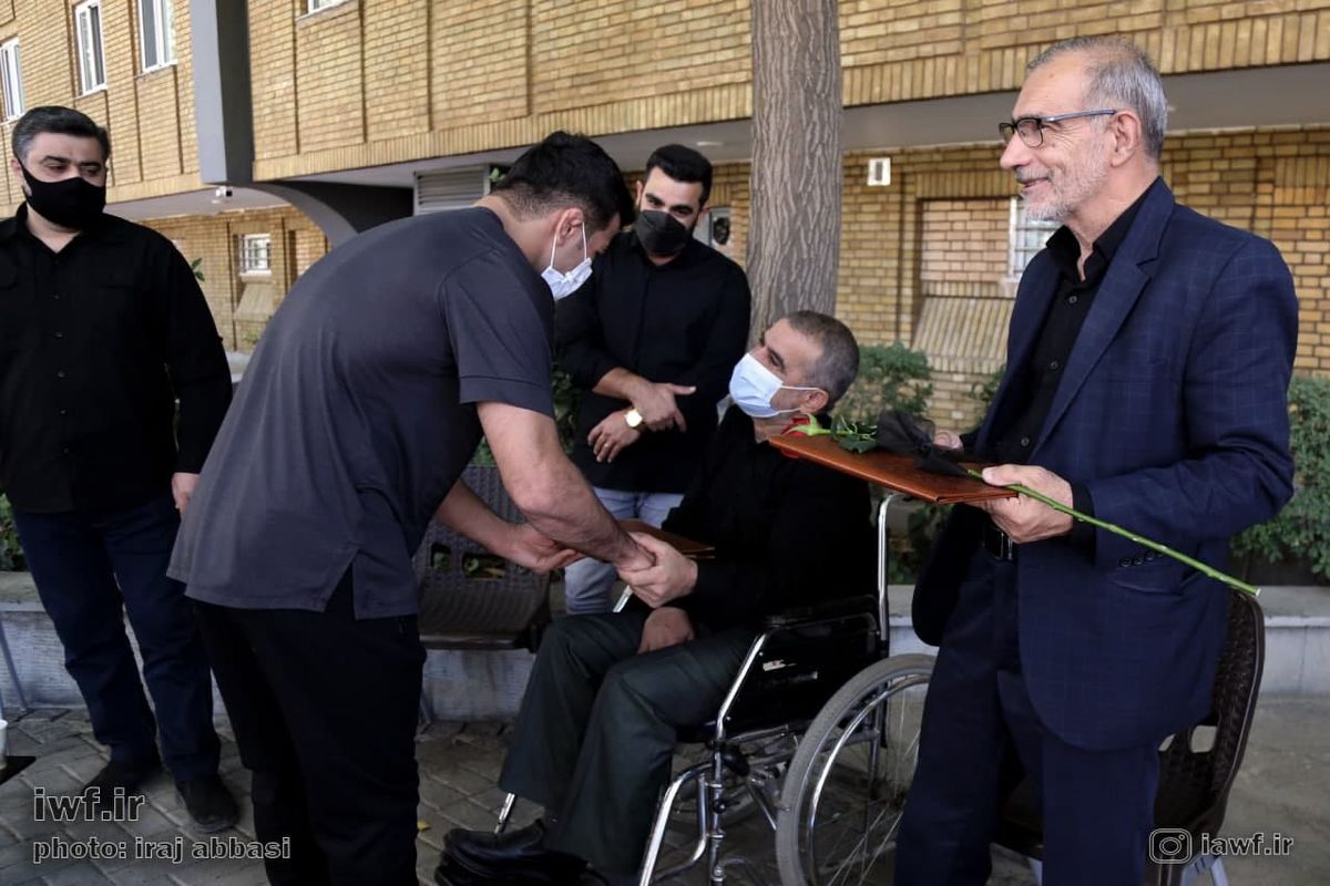 مراسم تجلیل از خانواده شهدا توسط فدراسیون کشتی برگزار شد