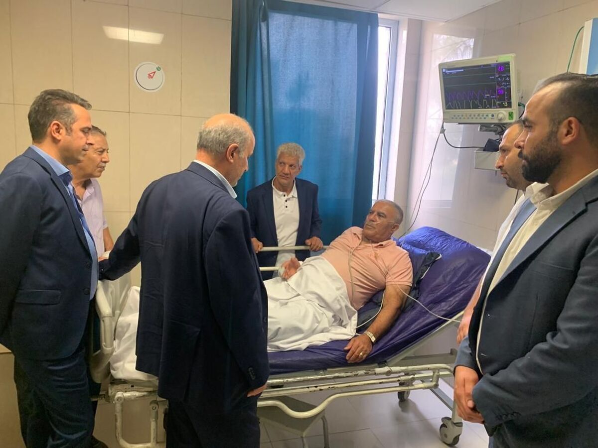 تاج و مدیران فدراسیون بر بالین حسن روشن