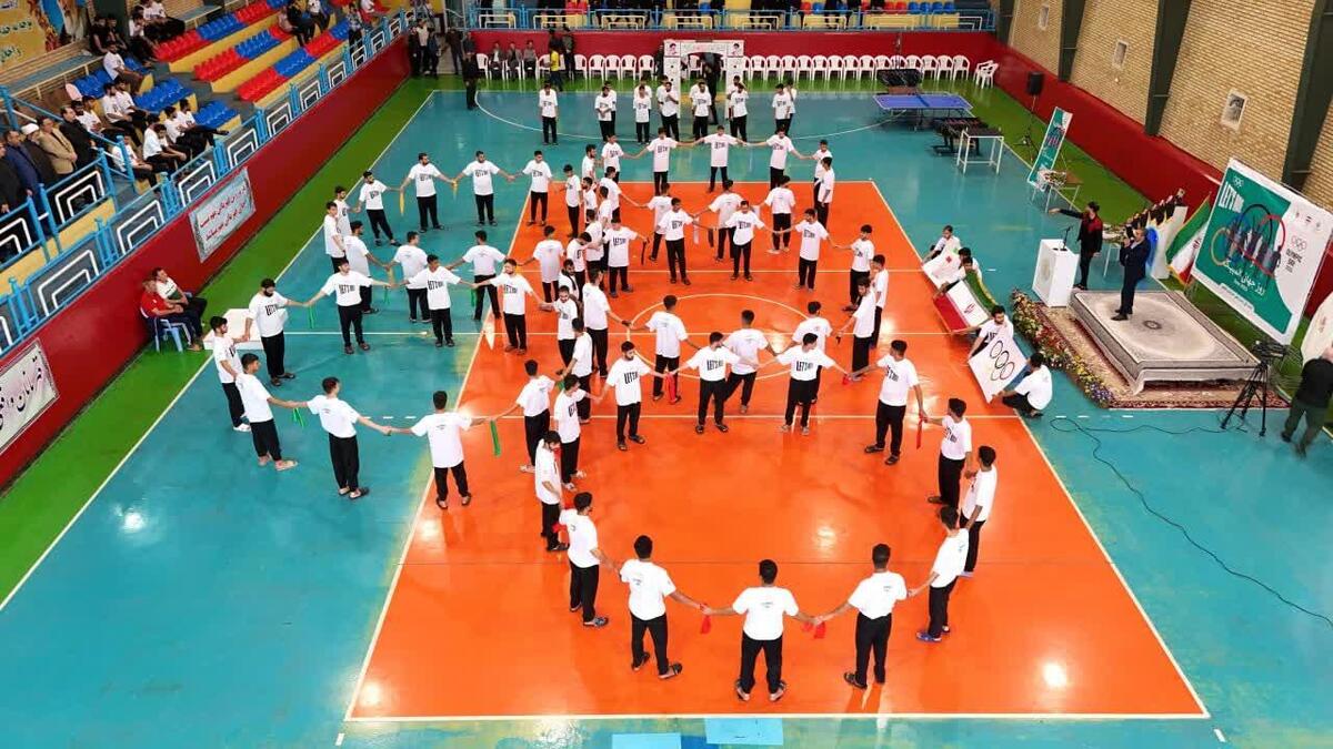 اهتزاز پنج حلقه المپیک در جوار بارگاه ملکوتی علی بن الموسی الرضا (ع)